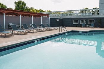 Sparkling swimming pool with cabana